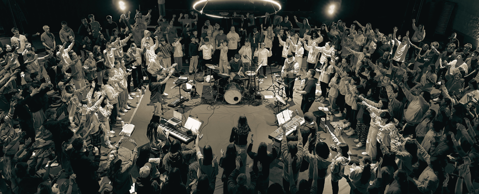 Students worshiping together at The LOFT