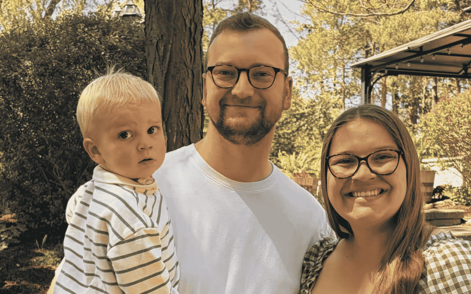 Nigel and Kelsey Fitch with their child